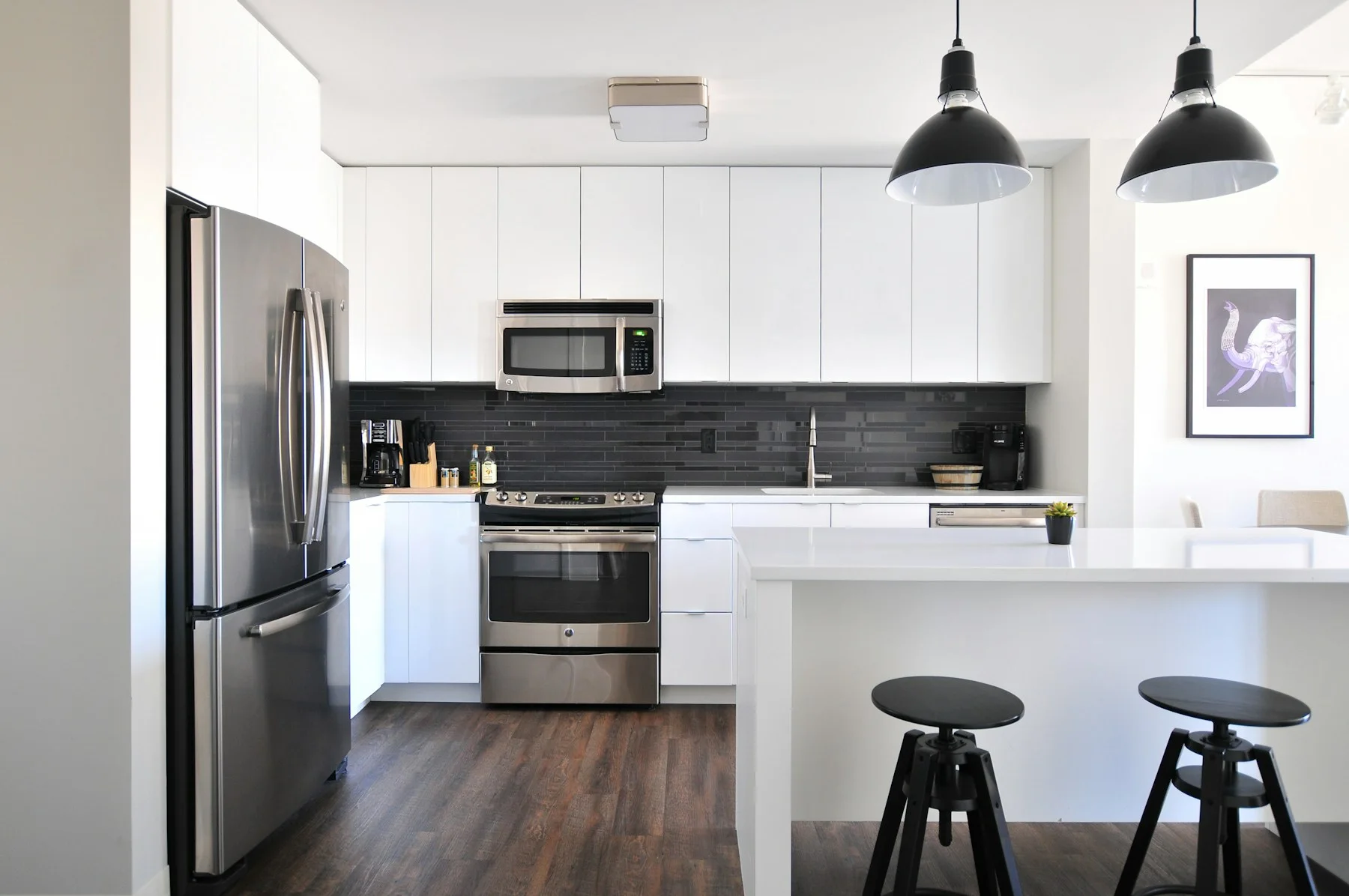 Minimal kitchen with light cabinets